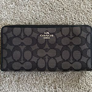 Coach Black wallet.